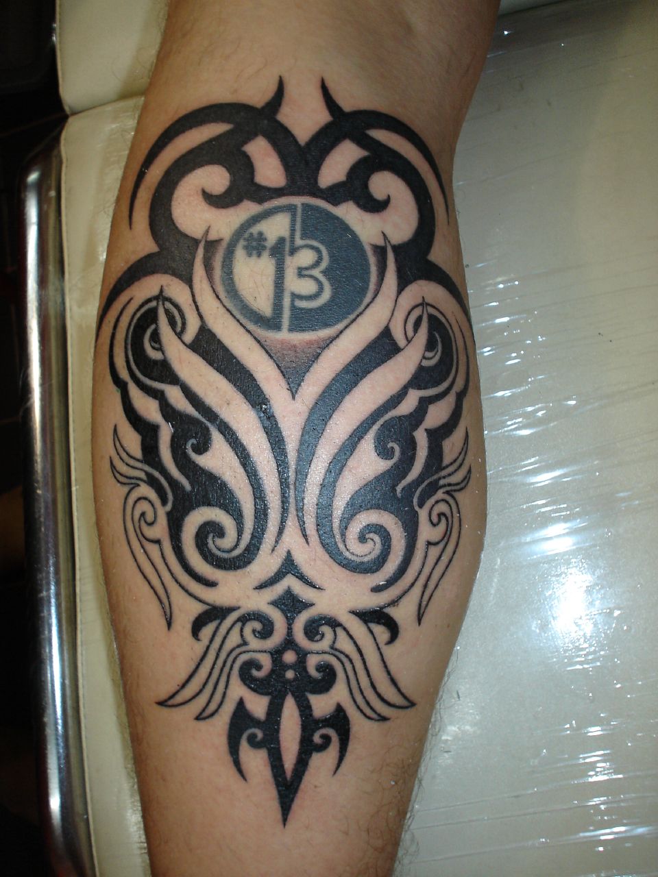 tribal tattoos calf muscle