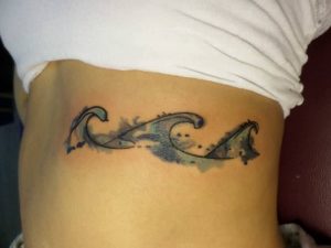 Wave Tattoo Ribs