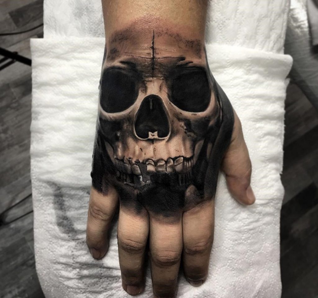 Skull Hand Tattoos Designs, Ideas and Meaning - Tattoos For You
