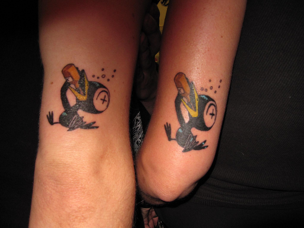1. "Father and Son" Matching Tattoo Designs - wide 5