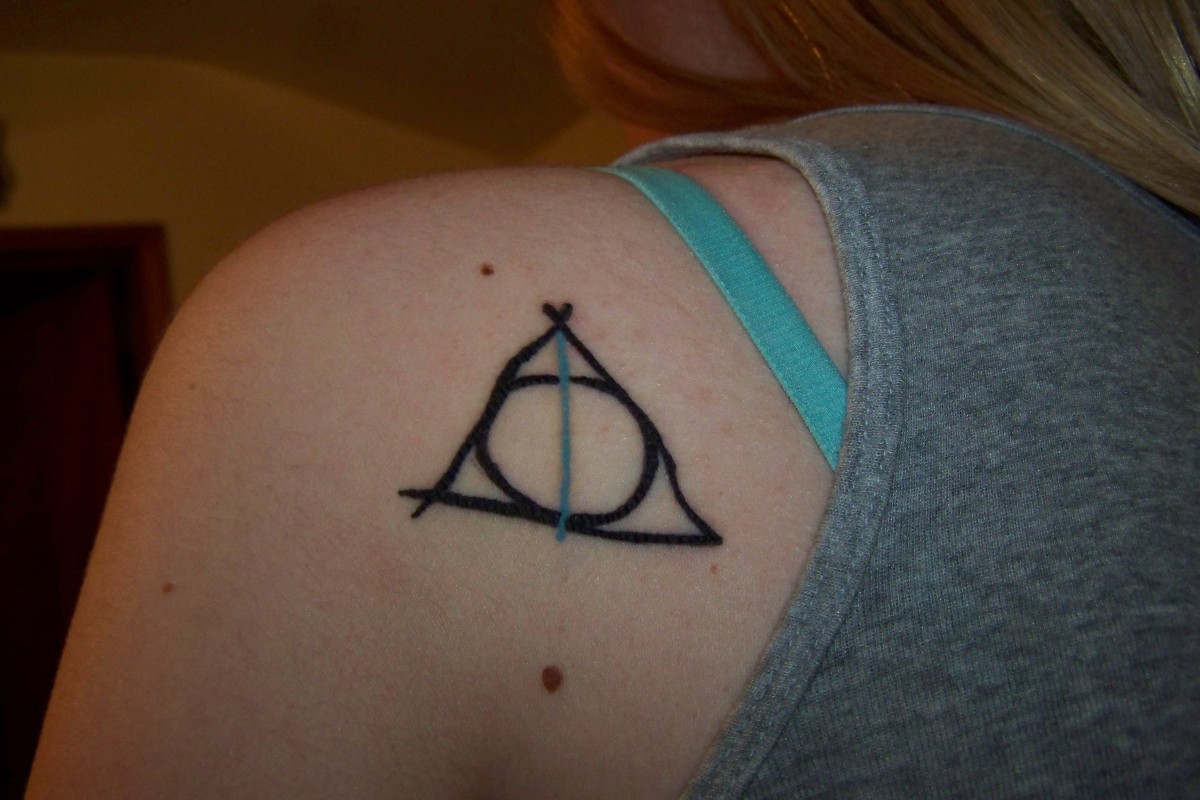 1. "Deathly Hallows symbol tattoo" - wide 4