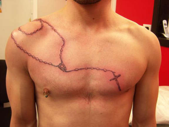 3. Rosary tattoo on chest for men - wide 3