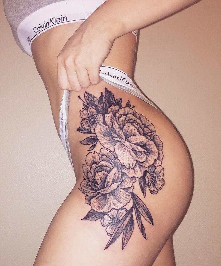 flower tattoos on thigh