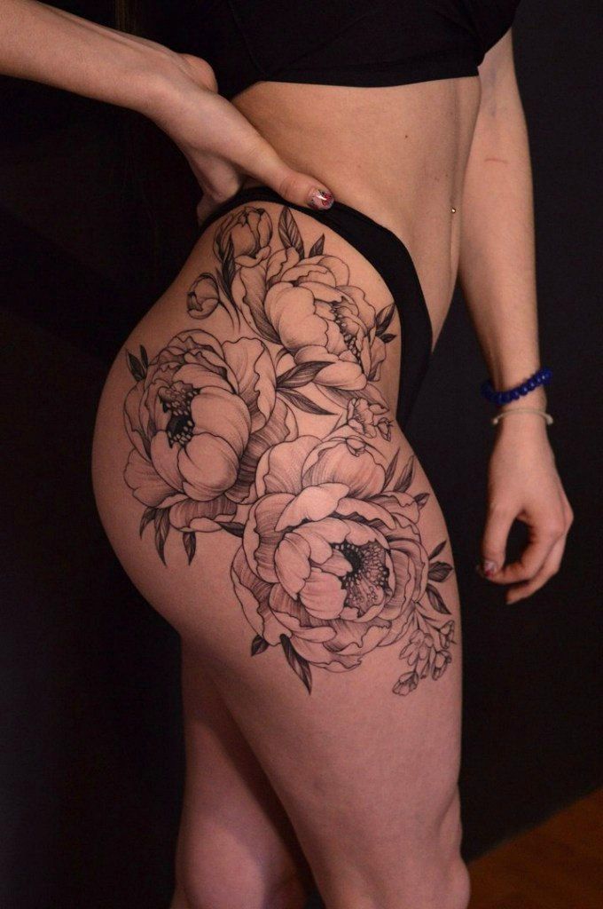 flower tattoo up thigh