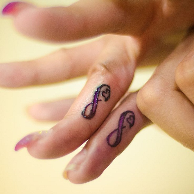 Senior Mans Hand With Infinity Symbol Tattoo On Finger Stock Photo   Download Image Now  iStock