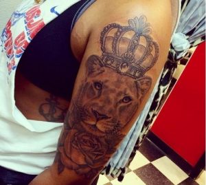 Lioness with Crown Tattoo