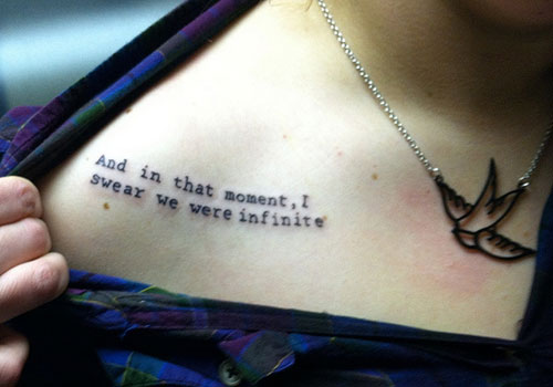 Female Chest Quote Tattoos