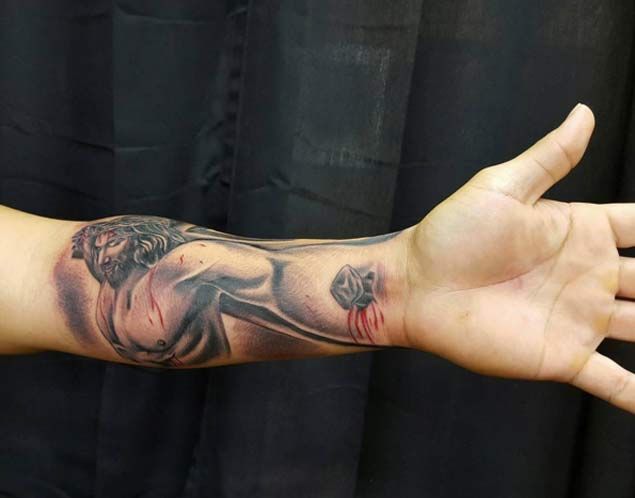 1. Jesus Arm Tattoo Designs - wide 9