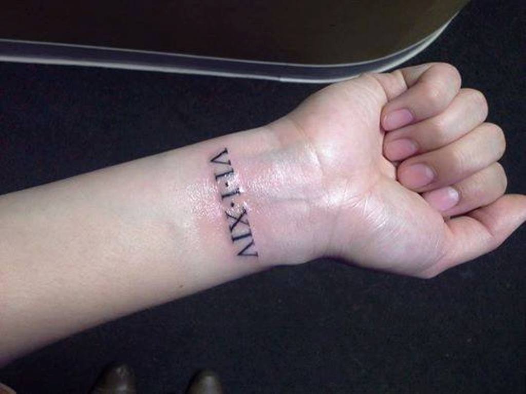 Roman Numerals Tattoo