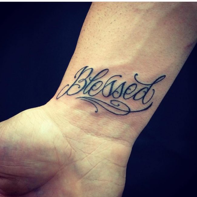 Blessed Tattoo on Wrist.