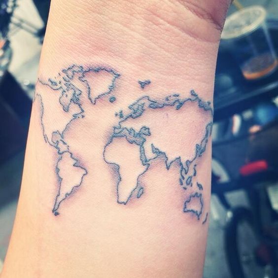 world tattoo on wrist